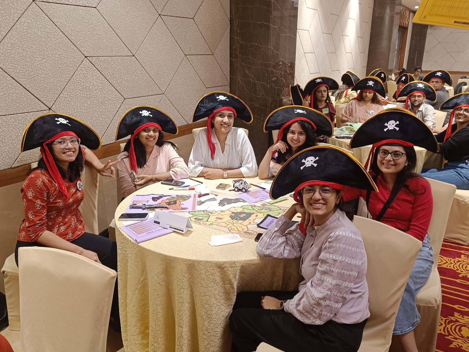 Women playing in best leadership offsite business simulation