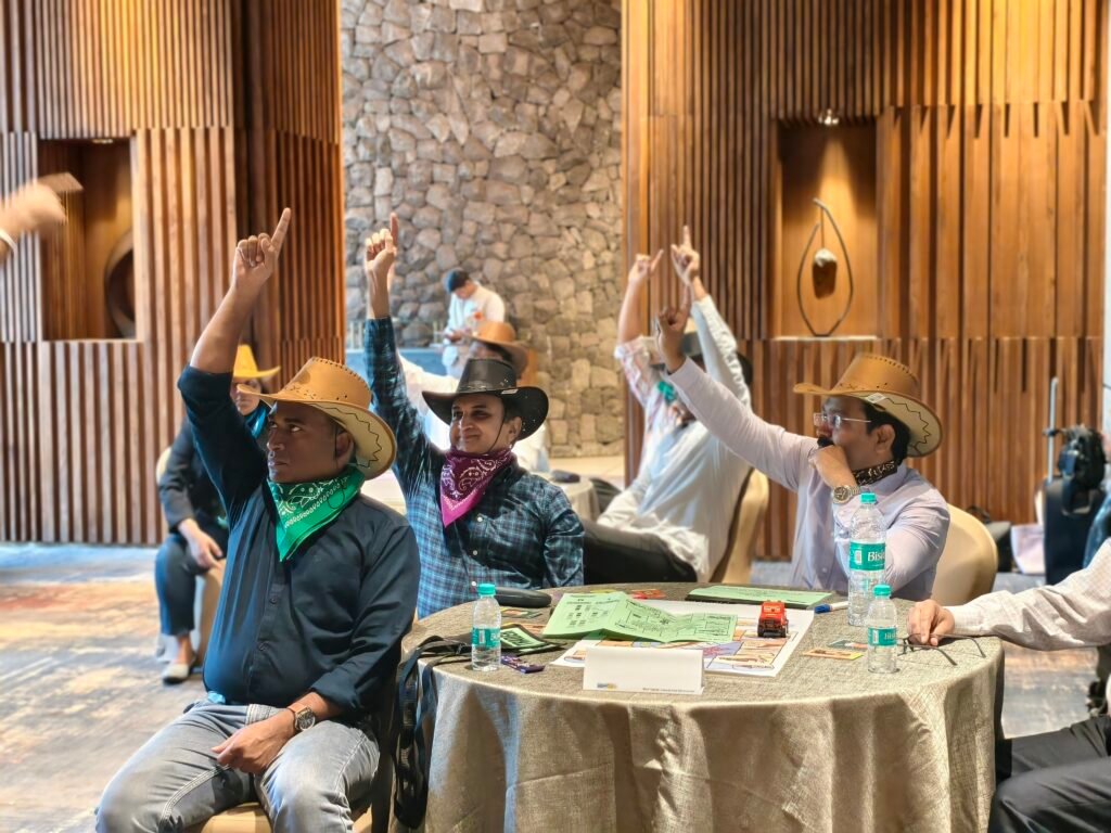 people enjoying business simulation conducted by simurise