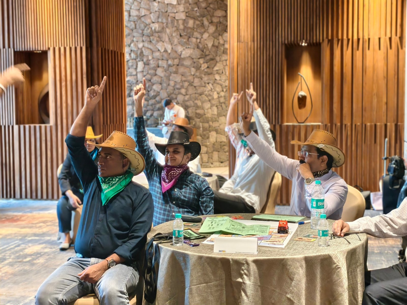 people enjoying business simulation conducted by simurise