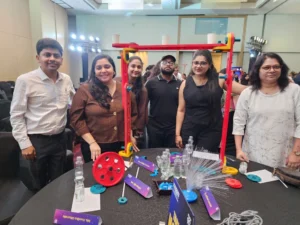 SimuRise experiential learning activity where corporate participants collaborate on a hands-on team challenge