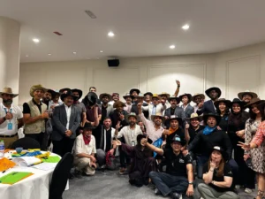 Group of leaders celebrating after a SimuRise business simulation and team alignment program