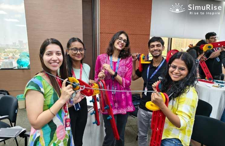 Top corporate company employees enjoying experiential learning business simulations
